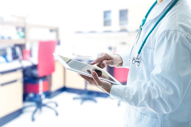 technician using a tablet in a lab